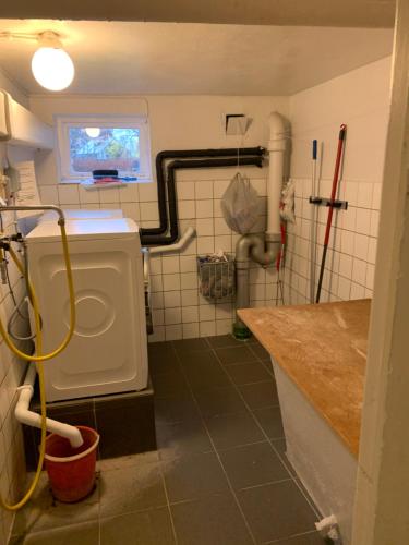 a bathroom with a sink and a toilet in it at Immaculat 4 Bed Apartment in Karlskrona in Karlskrona