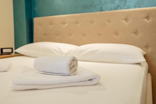 Un ou plusieurs lits dans un hébergement de l'établissement Guesthouse Villa Stari Grad