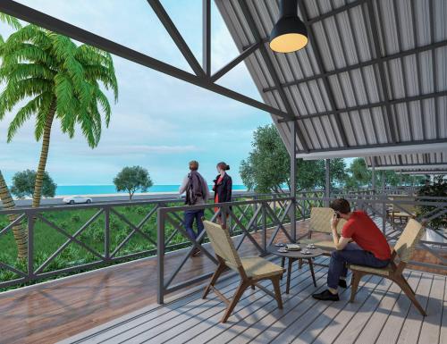 Balkón nebo terasa v ubytování Praveg Beach Resort Daman, Jampore Beach