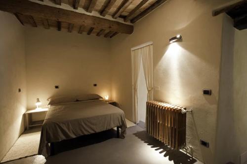 Een bed of bedden in een kamer bij Appartamento Gemma Grigia-tavoleto