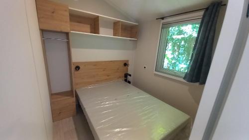 Postel nebo postele na pokoji v ubytování Camping l'Ardecho