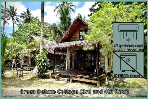 a green delivery cottage rdt and road with a sign at Coco Cottage - SHA Plus in Ko Ngai