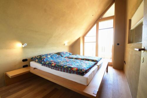 Un pat sau paturi într-o cameră la Hisa Vukan - Eco House in middle of vineyard with Sauna!