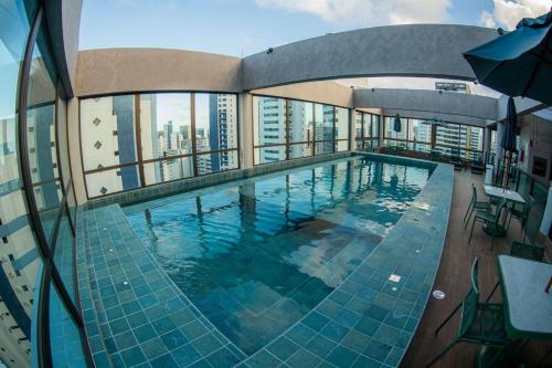 Kolam renang di atau dekat dengan BOA VIAGEM - FLAT ROOFTOP ALTO PADRÃO