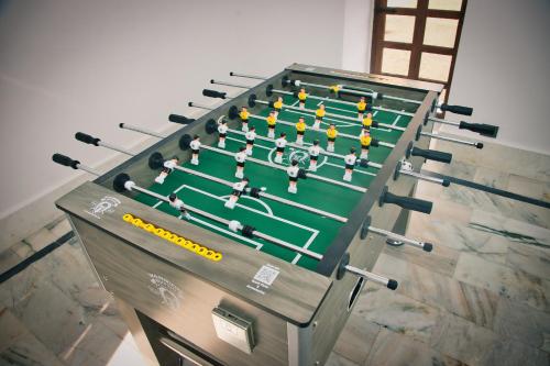 a table with toy soccer players on it at The Fern Bambora Fort, Bambora, Udaipur in Udaipur