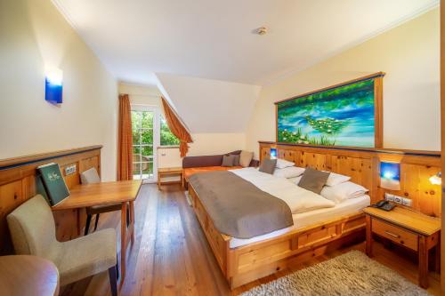 Ένα ή περισσότερα κρεβάτια σε δωμάτιο στο Wellness Hotel Kager Harkány