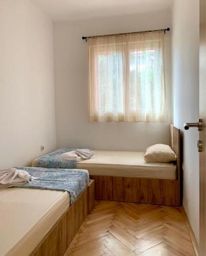 Postel nebo postele na pokoji v ubytování Central City Apartment