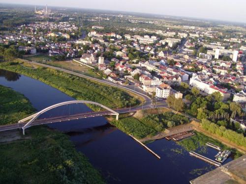 an aerial view of a bridge over a river at Apartament 11 Listopada in Ostrołęka