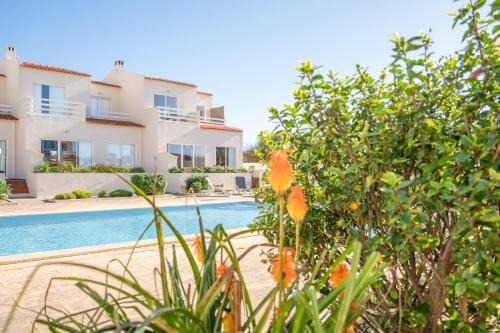 a view of a villa with a swimming pool at Casa Cabrita - Surf & Family House in Sagres in Sagres