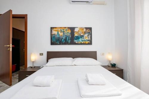 Llit o llits en una habitació de [IHost Apartment] - Veneziano 8