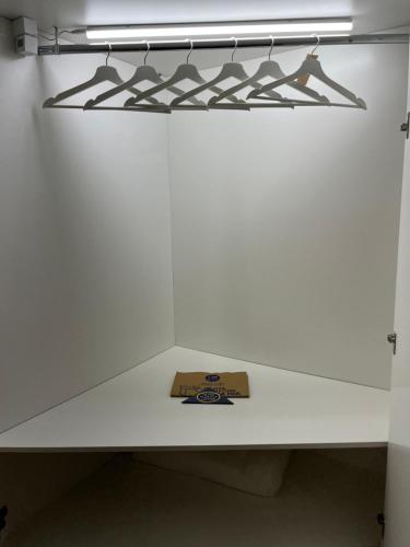 a white shelf in a room with a box on it at Ca Bea in Venice