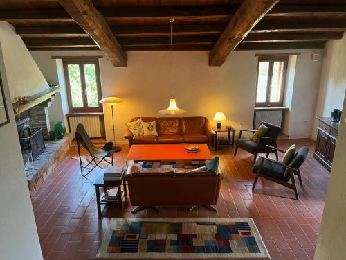 a living room with a couch and a table at Forca de Cerro in Spoleto