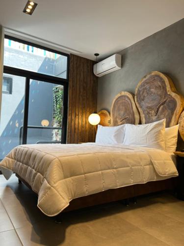 Cama o camas de una habitación en Hotel Zelva Negra