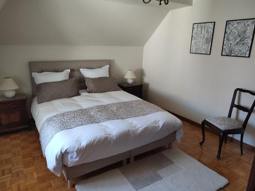 Кровать или кровати в номере Appartement des rives de l'Ehn