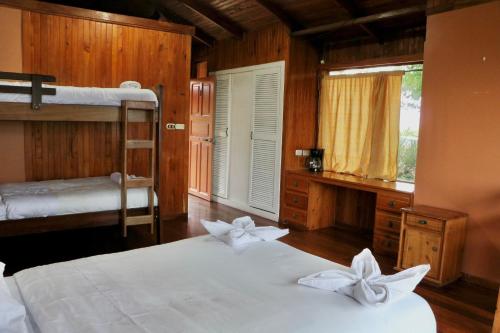 Krevet ili kreveti u jedinici u okviru objekta Poas Volcano & La Paz Waterfall Cabins