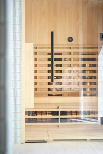 a display case in a building with wooden walls at Bella Monte in Szczyrk
