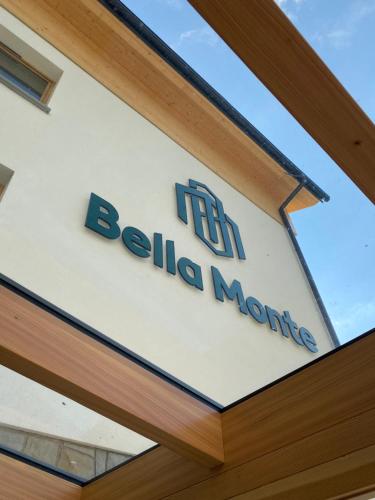 a sign for a bella metals building at Bella Monte in Szczyrk