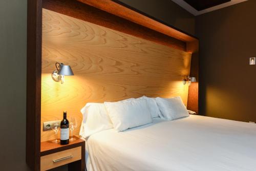 Postel nebo postele na pokoji v ubytování SOMMOS Hotel Aneto