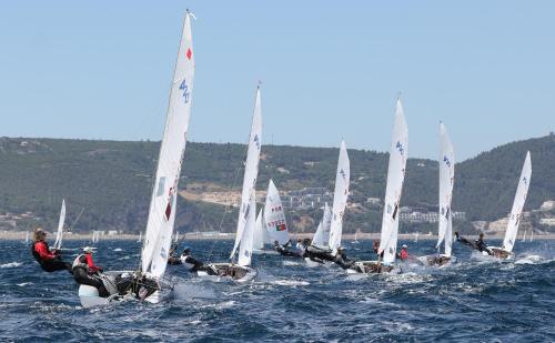 a group of sailboats are in the water at Four Points by Sheraton Sesimbra in Sesimbra