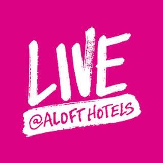 a pink sign with the words lite adott hotels at Aloft Dallas DFW Airport Grapevine in Coppell