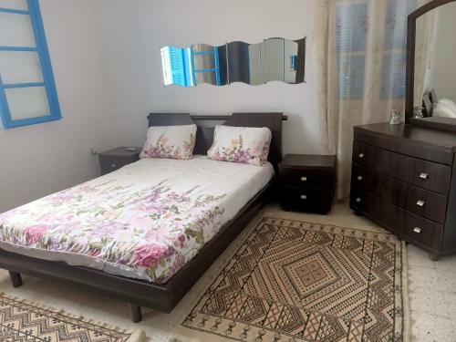 Postel nebo postele na pokoji v ubytování Villa Doudi