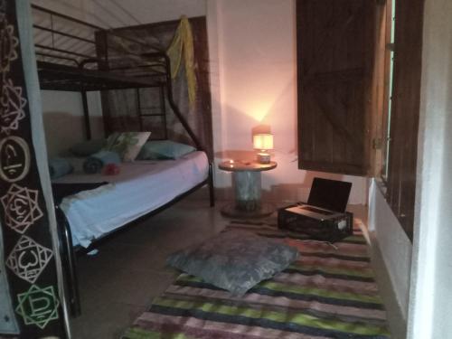 Postel nebo postele na pokoji v ubytování Hone sweet Hone (Piscine)