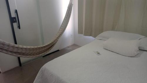 מיטה או מיטות בחדר ב-Salinas Atalaia -Flats Vale Di Serena