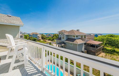a view from the balcony of a house at Simple Gifts by the Sea in Duck