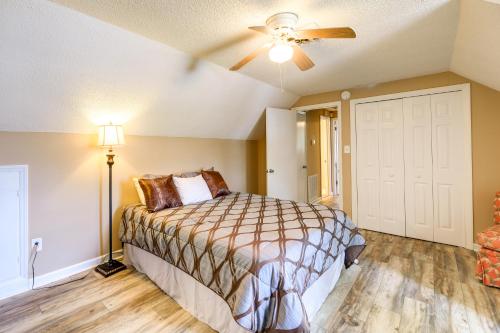 a bedroom with a bed and a ceiling fan at Cozy North Carolina Retreat Near Beaches and Golfing in Jacksonville