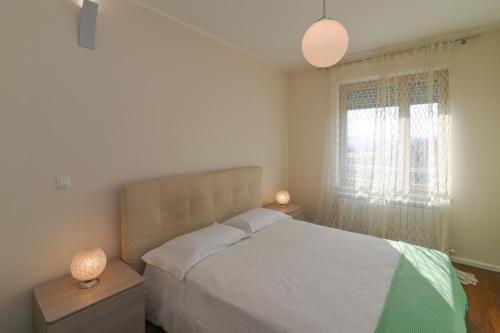 Posteľ alebo postele v izbe v ubytovaní Apartman TRSAT