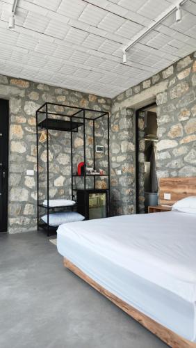 Postel nebo postele na pokoji v ubytování RUSTICO
