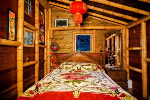 Una cama o camas en una habitación de Simba