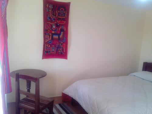Katil atau katil-katil dalam bilik di Hostal del Sol Isla del Sol