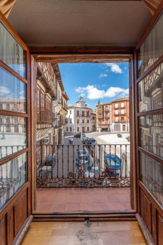 a view from a window of a balcony at Hotel Rincón Castellano in Cuéllar