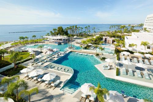 an aerial view of a resort with a pool at Parklane, a Luxury Collection Resort & Spa, Limassol in Limassol