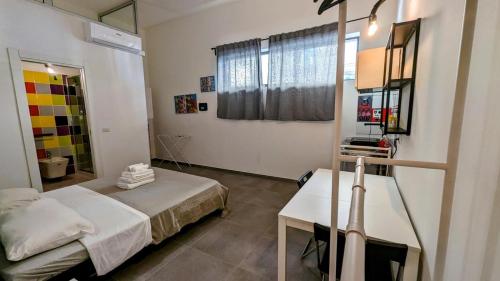 Postel nebo postele na pokoji v ubytování Accomodation Libertino
