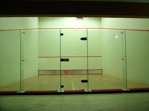 a room with a volleyball court with glass doors at VIP'S CLUB in Raipur