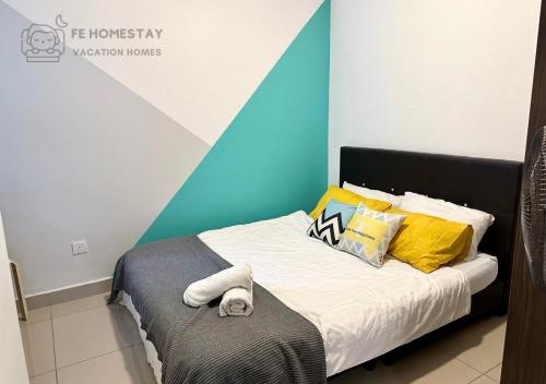 Кровать или кровати в номере FE Cozy Cameron Homestay Family 8 pax 3BR Palas Horizon Brinchang 金马伦民宿 8人3房
