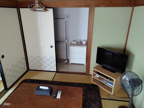 Televisyen dan/atau pusat hiburan di SIBARIAN Guest House