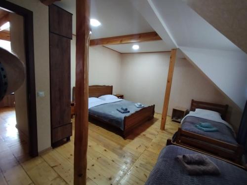 Postel nebo postele na pokoji v ubytování Melano apatment
