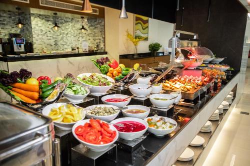  Elite Byblos Hotel -  Room  picture :   Minibar    Shower    Bath                           