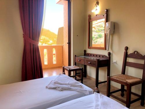 Postel nebo postele na pokoji v ubytování Lappa Hotel