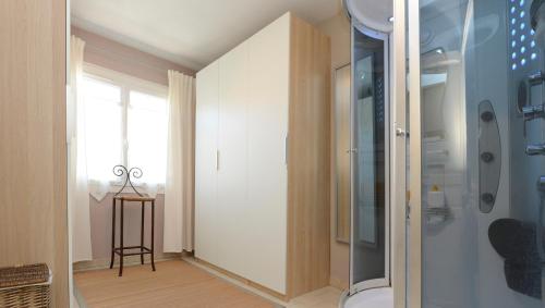 a bathroom with a shower and a toilet in a room at Maison avec piscine in Saint-Georges-dʼOrques