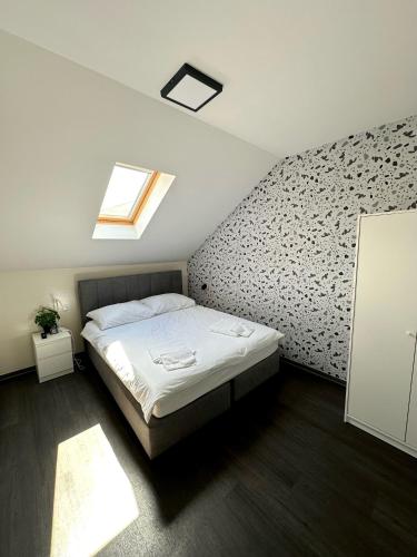 KAPTOL Roomsにあるベッド