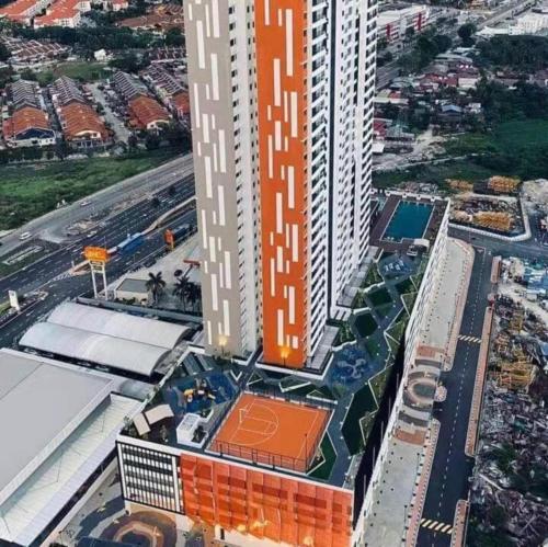 an overhead view of a city with a building at JOVIAL Modern Cozy Homestay `Meritus Perai in Perai