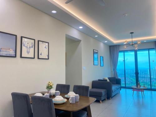 Posezení v ubytování JOVIAL Modern Cozy Homestay `Meritus Perai