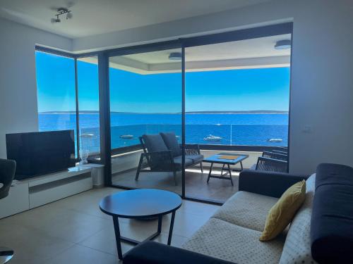 a living room with a view of the ocean at Apartman Lana&Bruno in Mandre