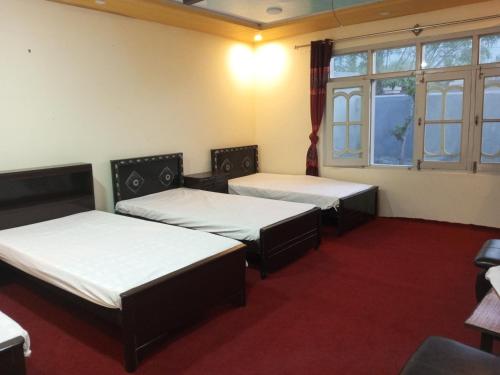En eller flere senge i et værelse på Stream View Guest House