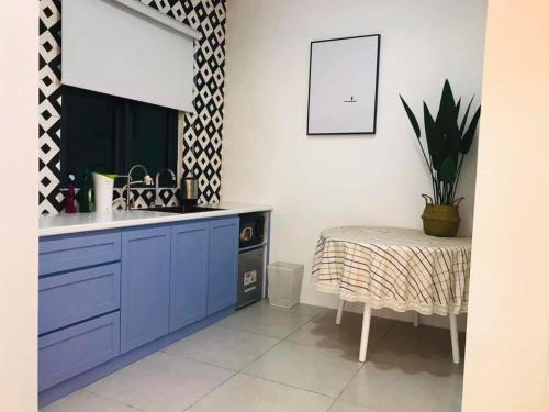 TV a/nebo společenská místnost v ubytování JOVIAL Modern Cozy Homestay `Meritus Perai