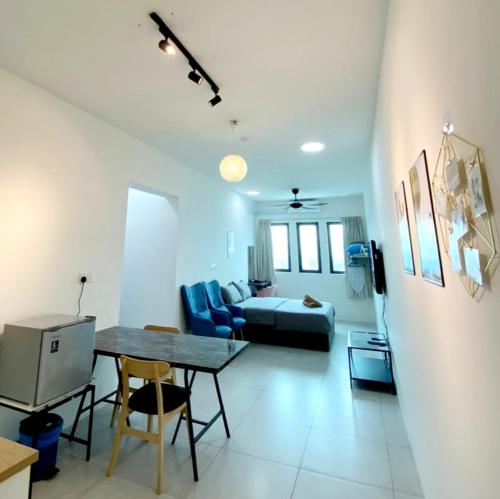 Posezení v ubytování JOVIAL Modern Cozy Homestay `Meritus Perai